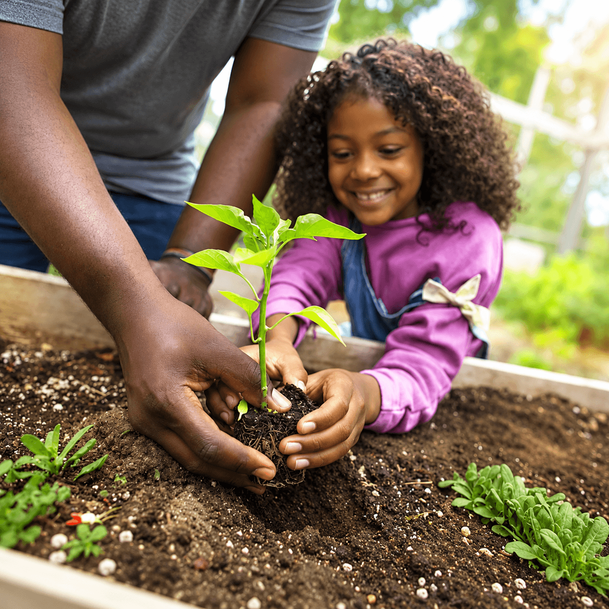 children and families learning to garden together with kid-friendly plants